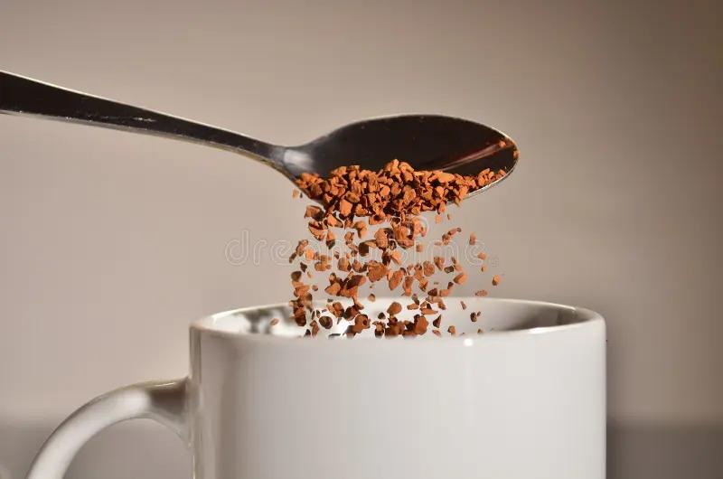 instant coffee pouring teaspoon mug 32221452