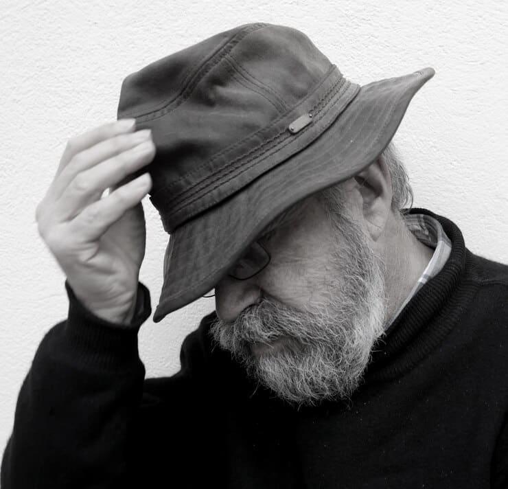 close up tensed man against wall 1048944 29598176