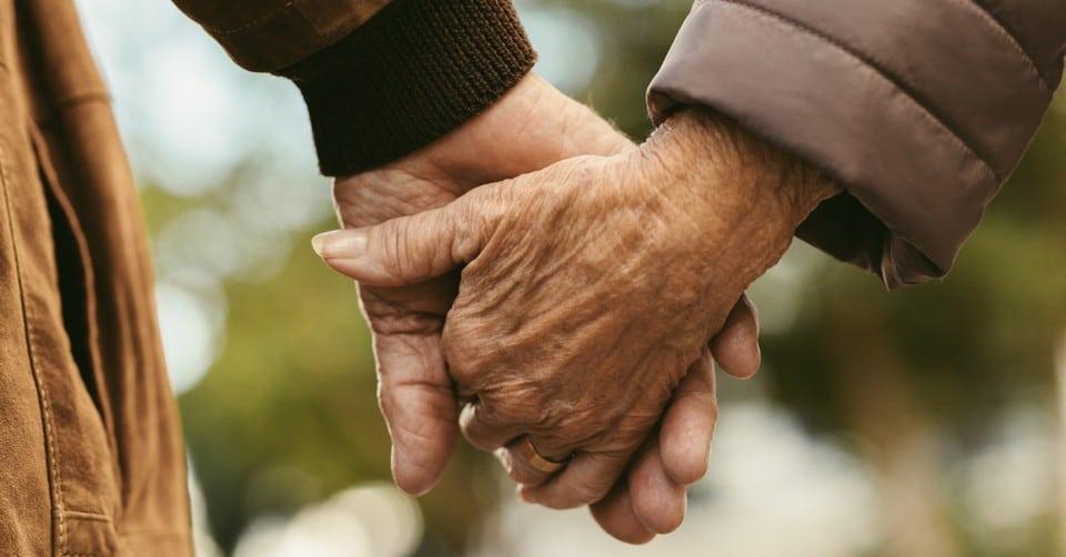 20589 elderly couple holding hands gettyimages jaco