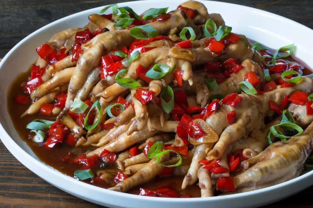 Σπουδαία οφέλη από τα πόδια κοτόπουλου 2 braised chicken feet with hoisin sauce and peppers hr 9016
