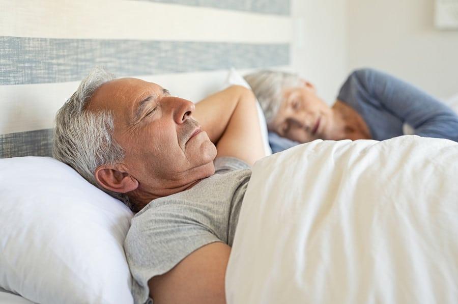 bigstock senior man and woman sleeping 270492709
