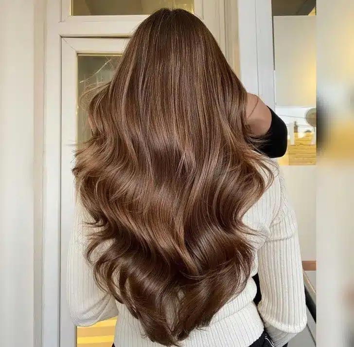 hot chocolate brunette autumn hair color ideas with light honey highlights