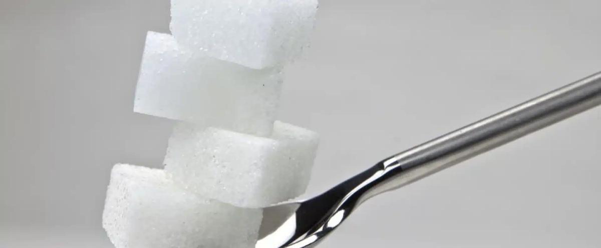 sugar cubes on spoon
