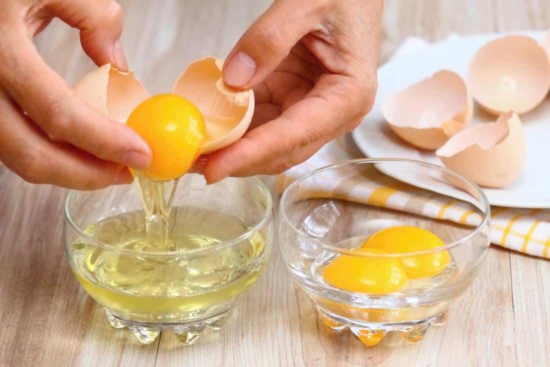 separating egg whites from egg yolks to make a face mask