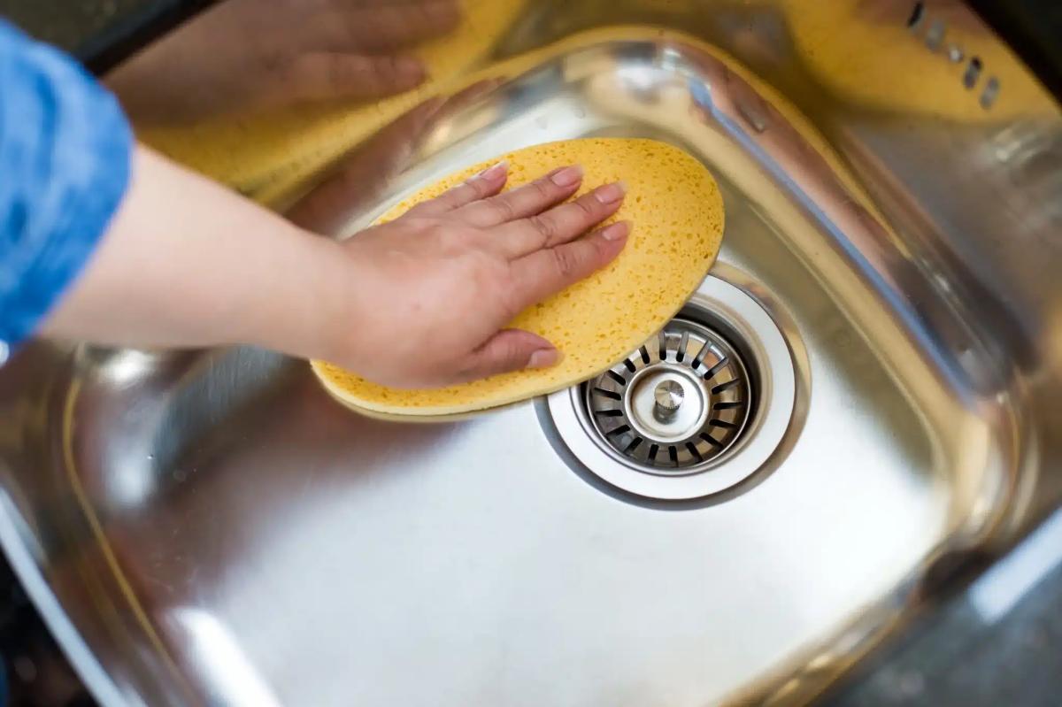 final touches for a gleaming sink