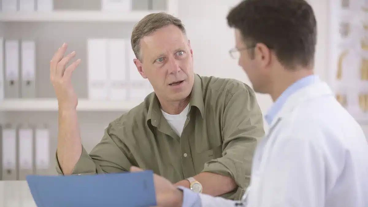 37aa7030 bigstock doctor talking to mature male 34397057