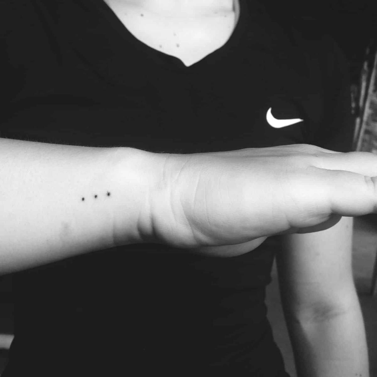 three dots minimalist hand poked tattoo