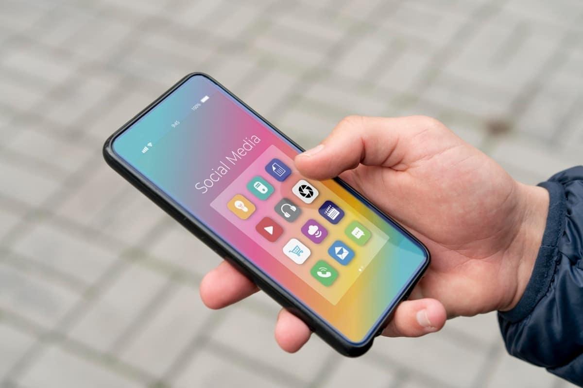close up hand holding smartphone